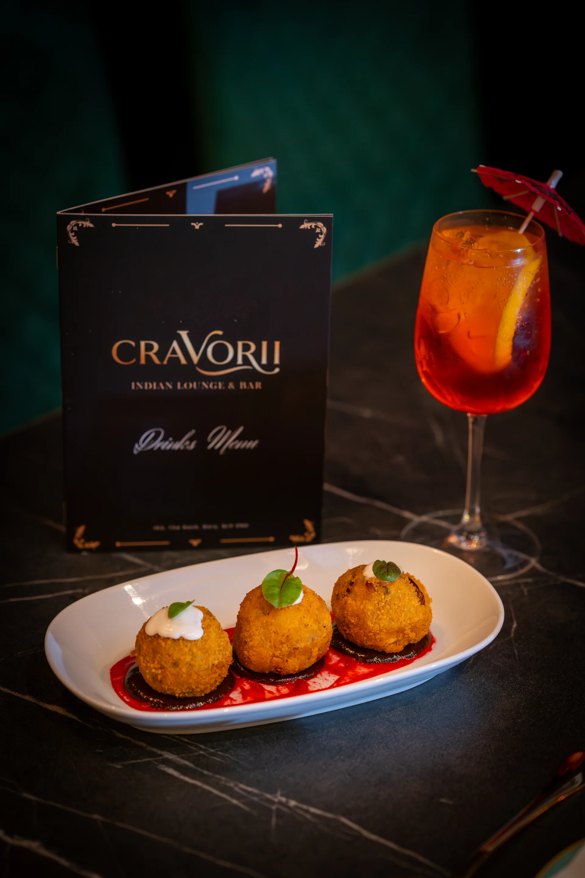 Cravorii Aperol cocktail with fried starters